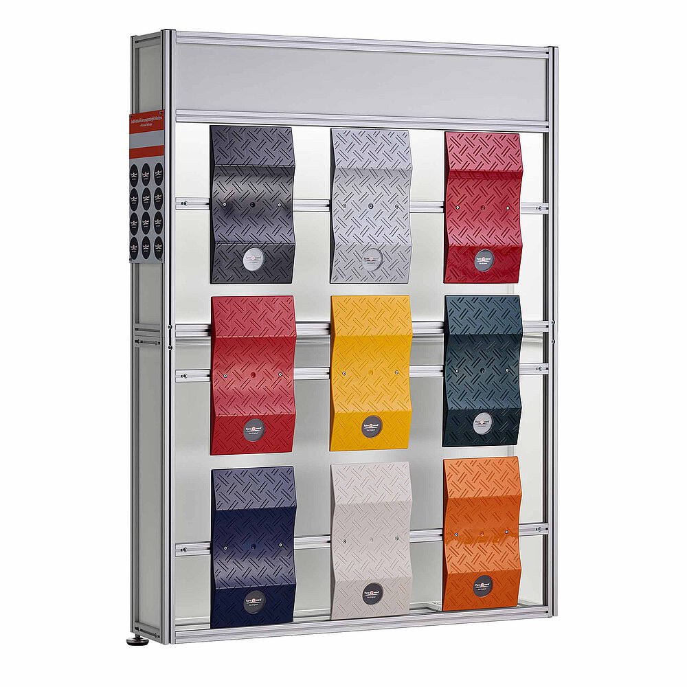 a tall, slim, dismountable product display made of aluminium profiles with nine vertically fastened, differently-coloured TyreGuard® tyre protectors on the front, mounted on one stainless steel levelling element at the bottom, isolated on white background