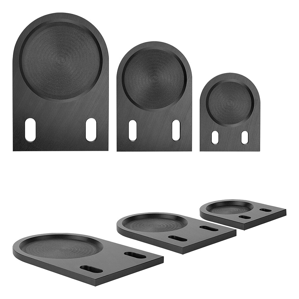 a selection of six black floor-fixture plates for levelling elements, made of precision-milled composite material, isolated on white background